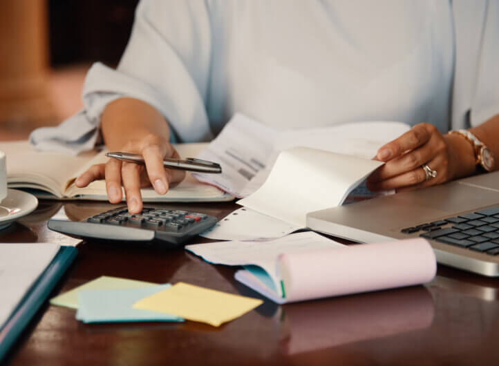 payroll person working with bills