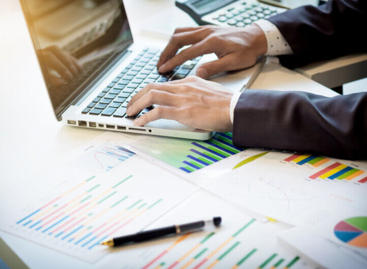working process, business man typing on laptop.