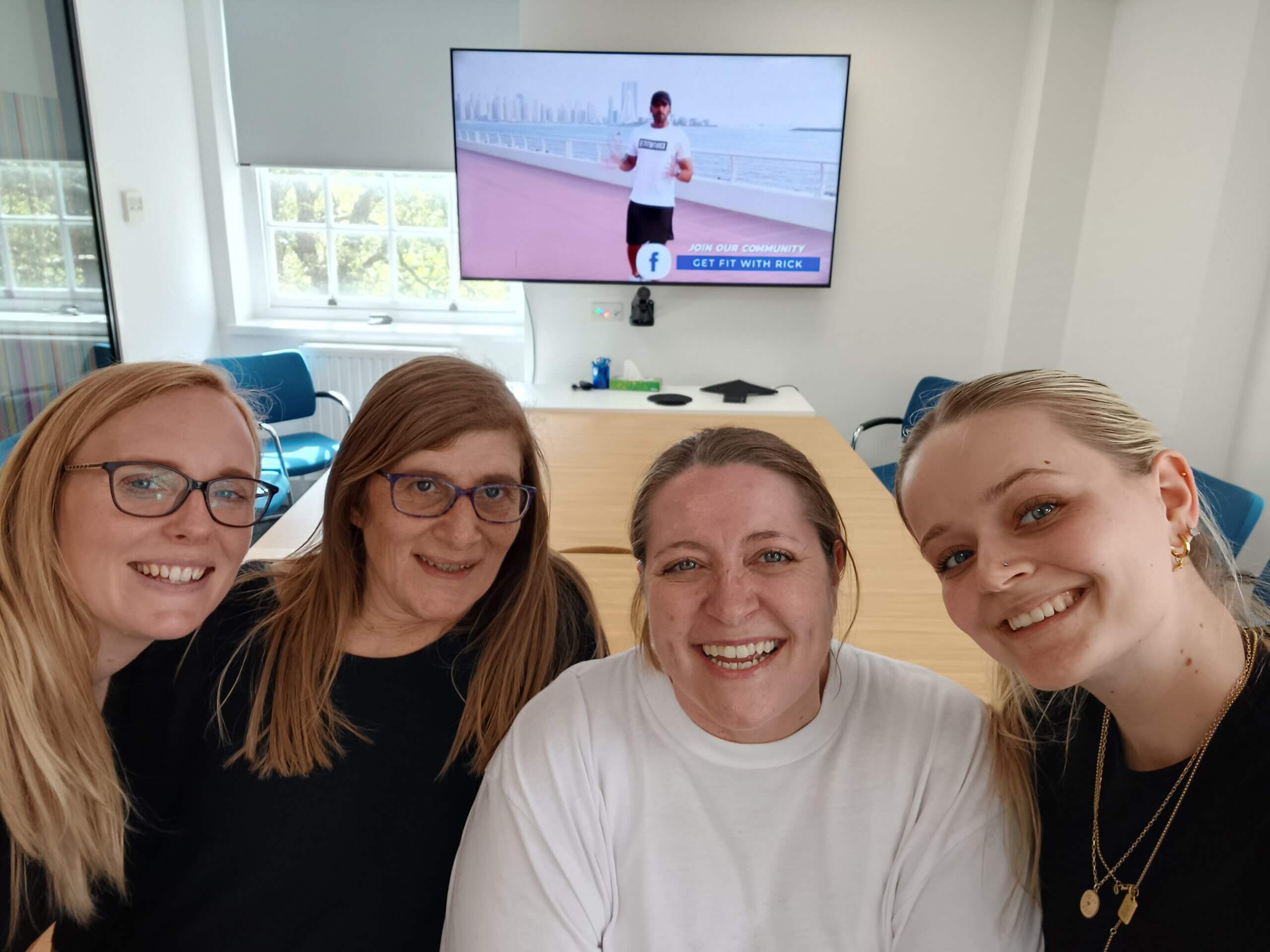 Photo of our London admin team working out for the step challenge in the office.